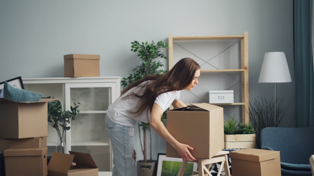 Careful packing in progress on an All in Moving Systems job